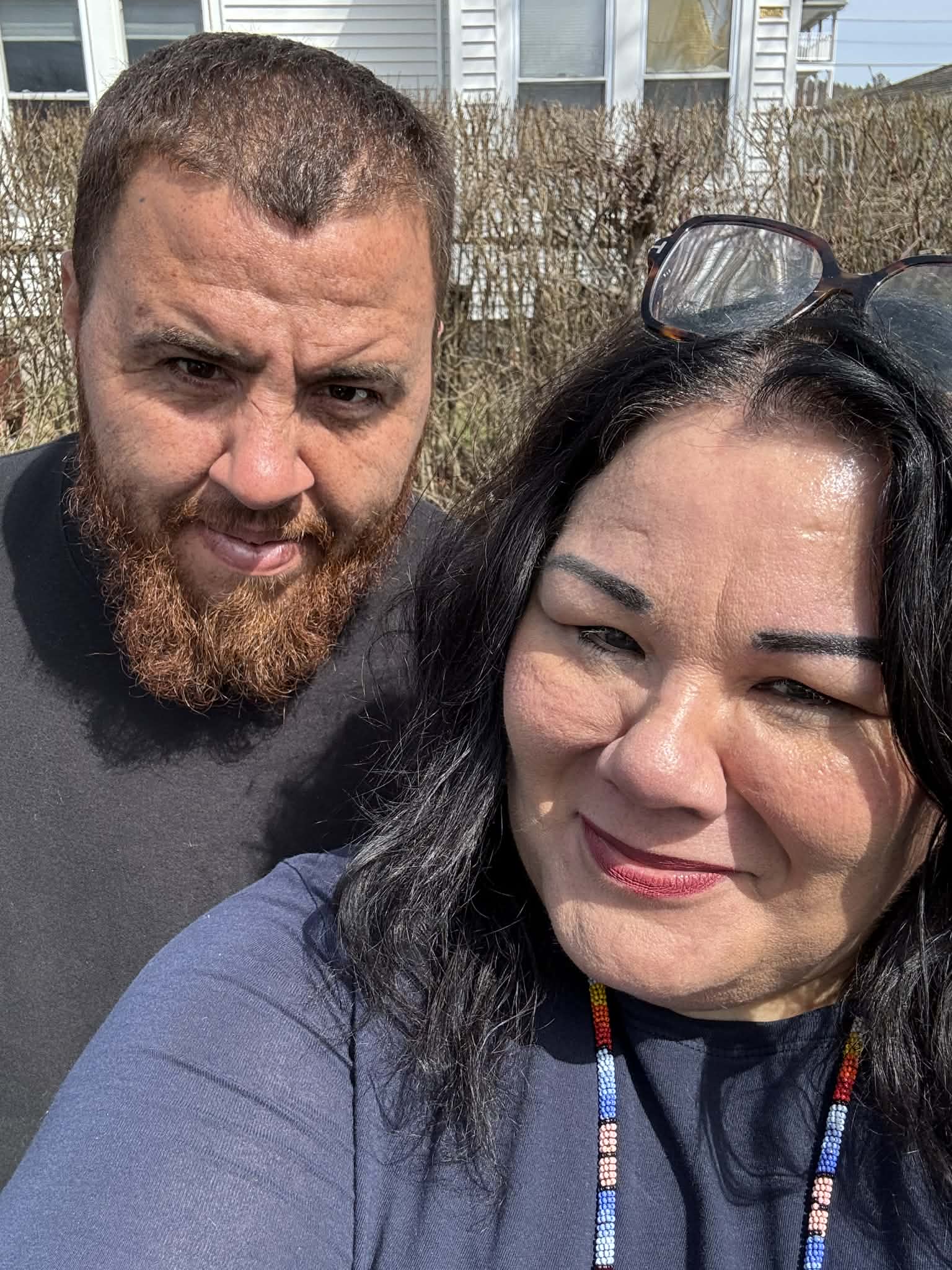 Two community members taking an outdoor selfie
